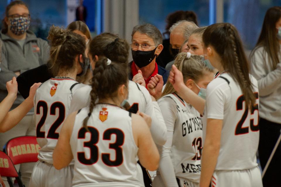 Gwynedd Mercy Academy head coach Tom Lonergan talks to his team before the start of overtime on Monday, March 1, 2021. Gwynedd Mercy Academy lost to St. Basil Academy, 44-43, in overtime of the Catholic Academies championship game.