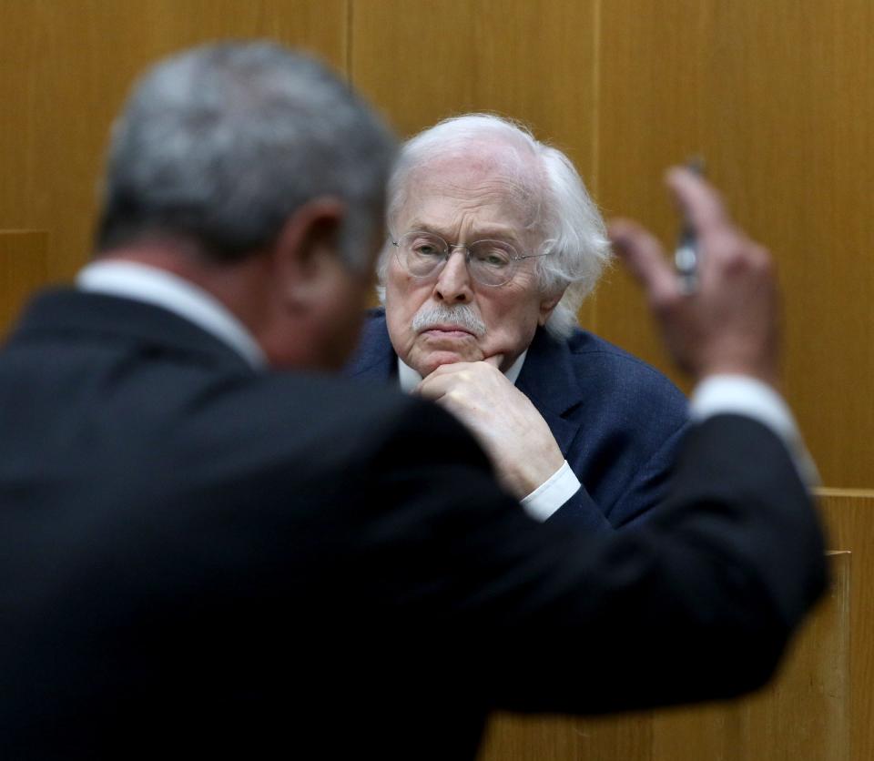 Forensic pathologist Dr. Michael Baden listens to a question from Christopher Gregor's defense attorney attorney Mario Gallucci during trial before Superior Court Judge Guy P. Ryan in Toms River Tuesday, May 8, 2024. Gregor is charged with the 2021 murder and child endangerment of his 6-year-old son Corey Micciolo.