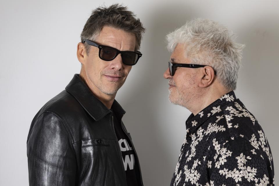 Ethan Hawke, left, and director Pedro Almodovar pose for portrait photographs for the film 'Strange Way of Life' at the 76th international film festival, Cannes, southern France, Thursday, May 18, 2023. (Photo by Joel C Ryan/Invision/AP)