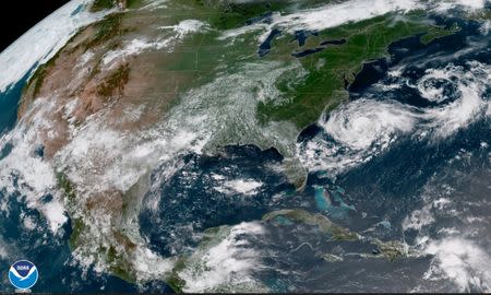 Tropical Storm Chris is shown off the eastern coast of North and South Carolina, U.S., in this satellite image July 9, 2018 at 16:12 UTC. NOAA/Goes-East Imagery/Handout via REUTERS
