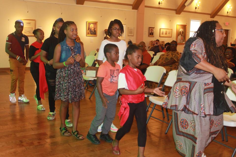 Participants of the history program hosted by the Susie Long Women's Missionary Society danced during the ceremony on Sunday (Aug. 27, 2023) at the Cotton Club Museum and Cultural Center in Gainesville.