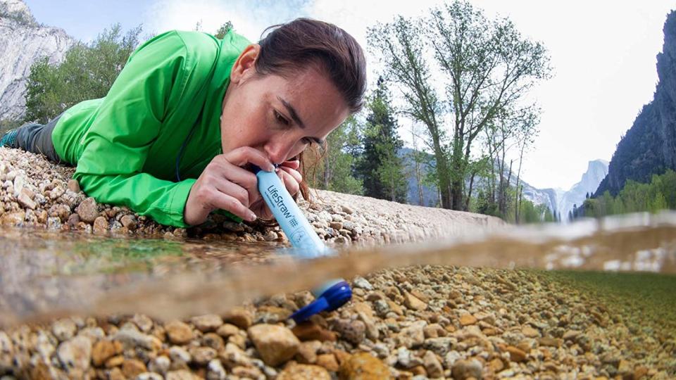 A person using the LifeStraw. - Credit: LifeStraw/Amazon