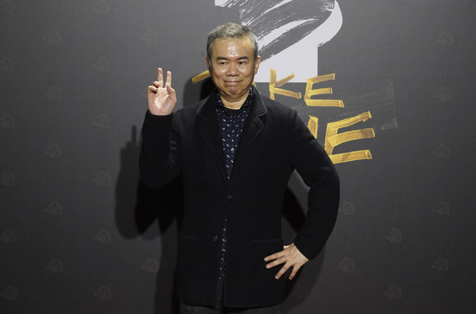 Taiwanese director Chen Yu-hsun arrives at the 57th Golden Horse Awards in Taipei, Taiwan, Saturday, Nov. 21, 2020. Chen is nominated for Best Director for the film My Missing Valentine" at this year's Golden Horse Awards. (AP Photo/Billy Dai)