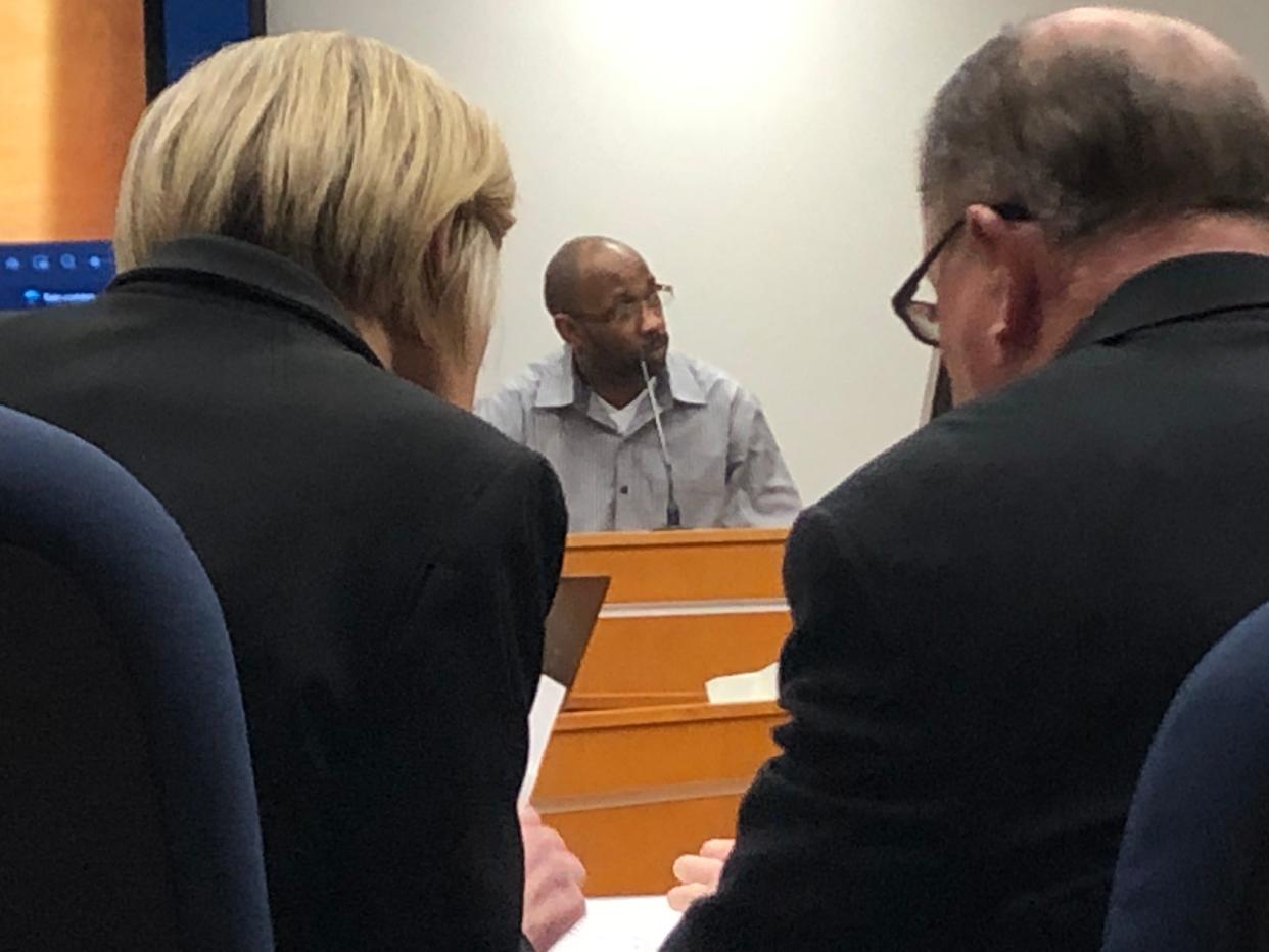 Orlando Alexander Sr. answers questions while testifying at his own murder trial on April 20, 2022, in Peoria County Circuit Court.