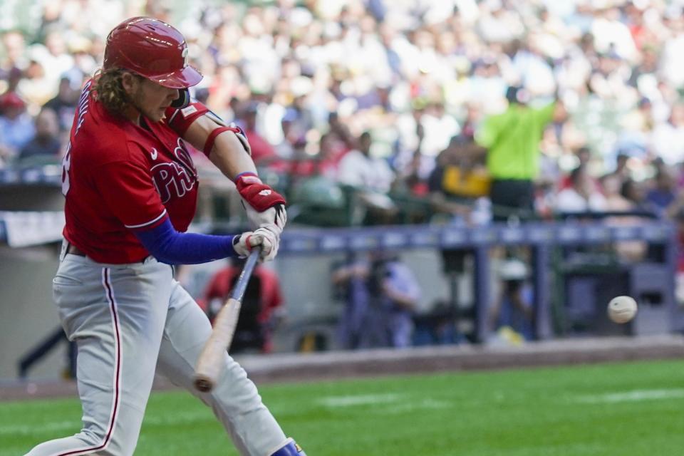 Philadelphia Phillies' Alec Bohm hits a home run during the seventh inning of a baseball game against the Milwaukee Brewers Sunday, Sept. 3, 2023, in Milwaukee. (AP Photo/Morry Gash)