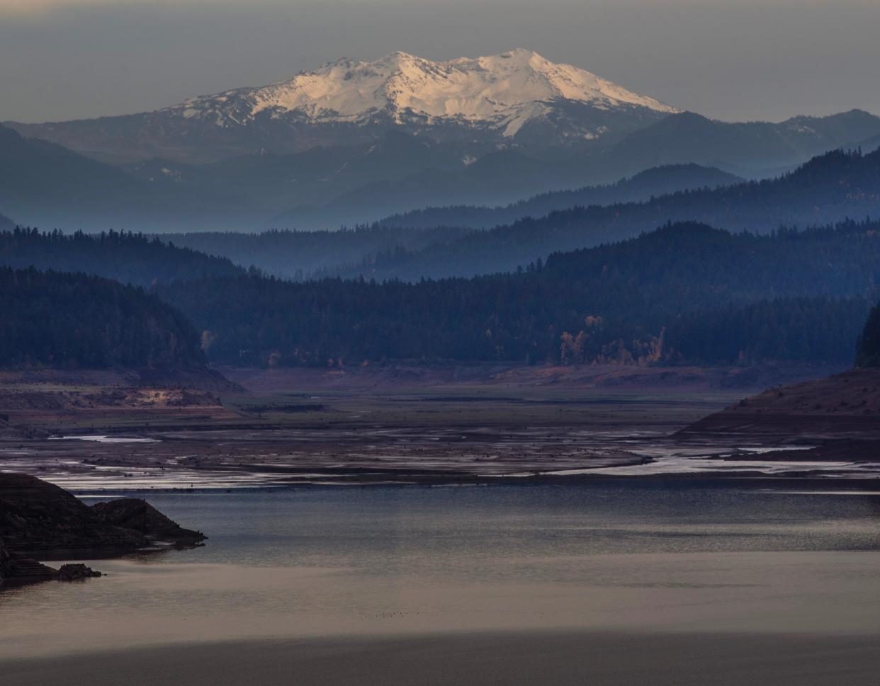 Diamond Peak rises over Lookout Point Reservoir near Lowell.