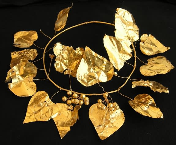 A gold wreath in the shape of an ivy plant discovered at a 2,400-year-old tomb complex in Cyprus.