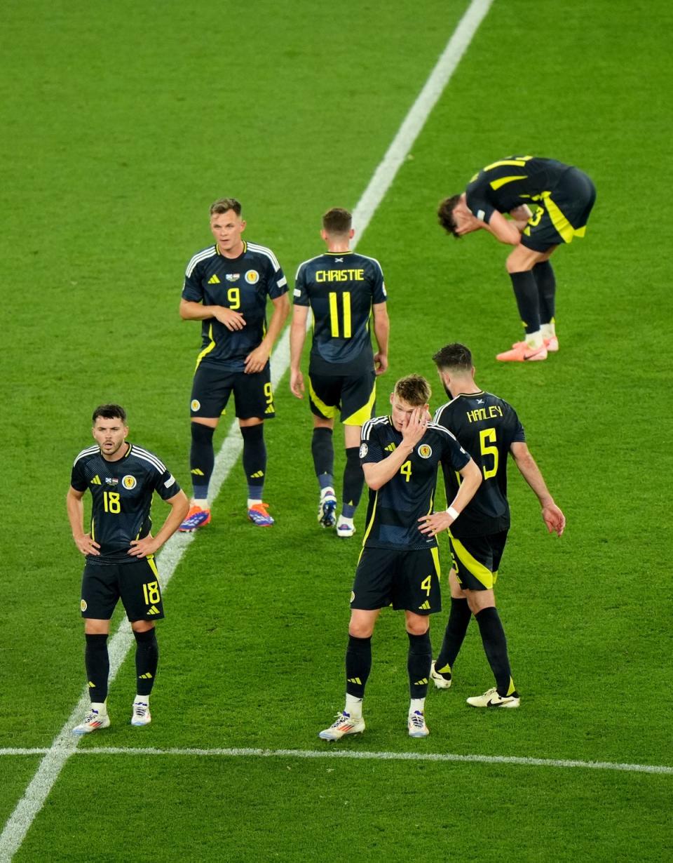 Scotland players react to being beaten by Hungary (Bradley Collyer/PA Wire)