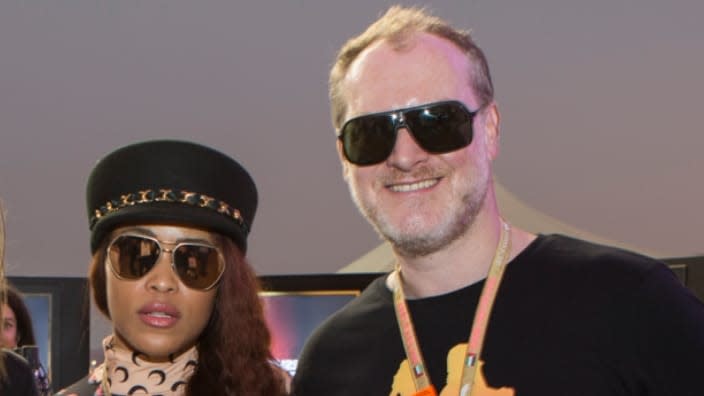 Rap artist-actress Eve (left) and her husband, Maximillion Cooper, are shown at the Formula 1 Etihad Airways Grand Prix. (Photo: Darren Arthur/Getty Images)