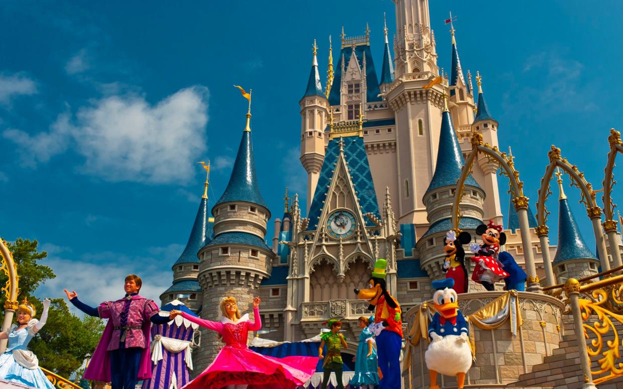 Rev Edward George Ganster left the priesthood and applied to work at Walt Disney World in Florida, securing the job with a reference from his Pennsylvania diocese - Corbis Documentary