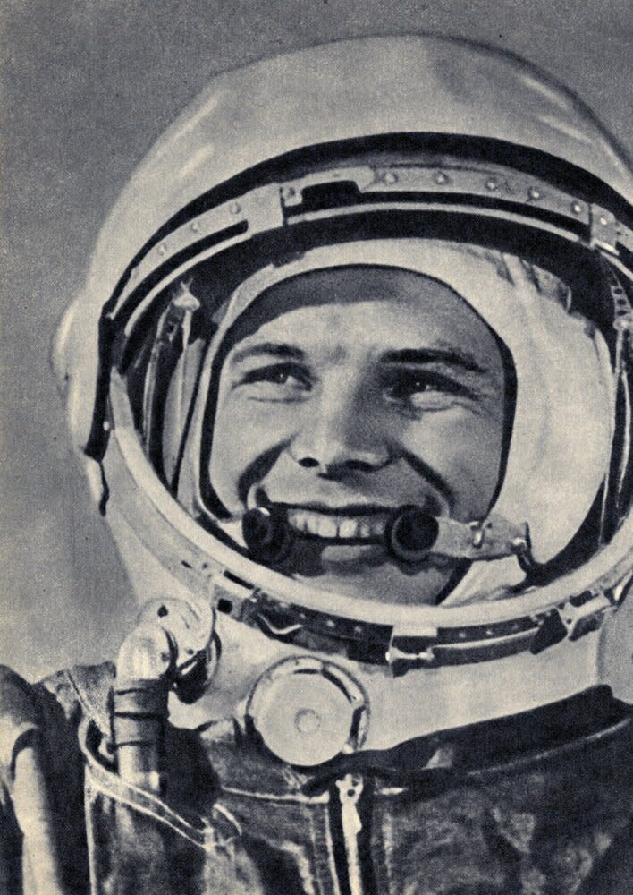 The caption reads, "Contemporaries will describe his achievement, poets and writers will glorify his bravery...For the people, the memory of his face in the cosmonaut's helmet, will remain."