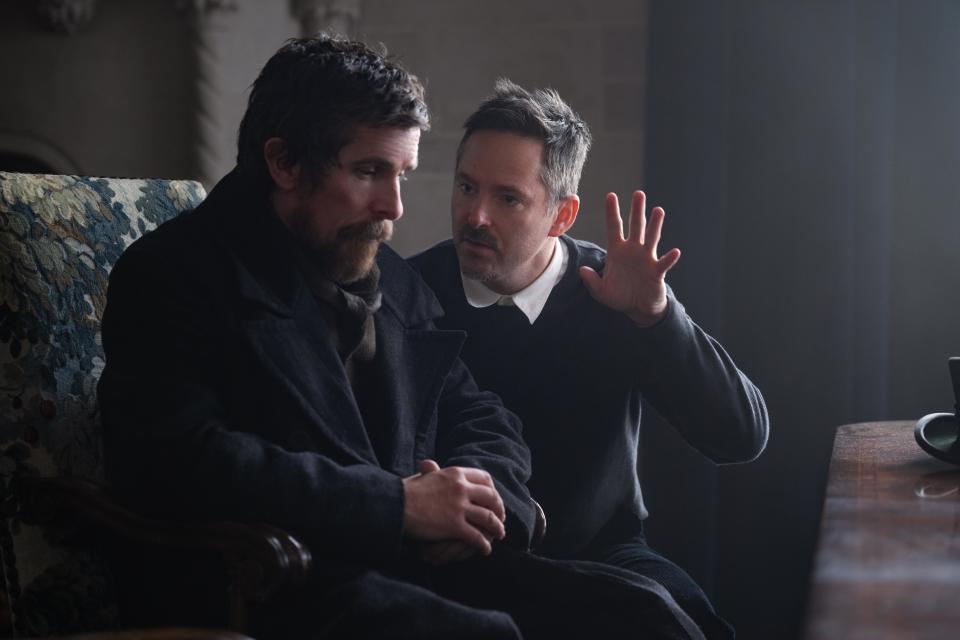 (L to R) Christian Bale as Augustus Landor and Scott Cooper (Director/Writer) on the set of The Pale Blue Eye. (Scott Garfield/Netflix)