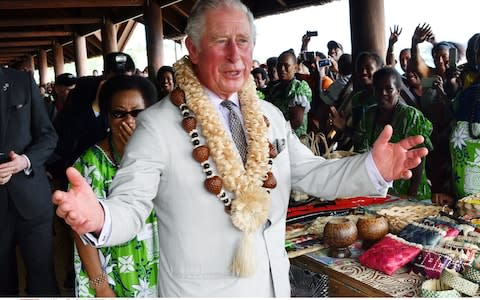 Prince Charles sporting a traditional garland on Vanuatu - Credit: Tim Rooke/REX/Shutterstock