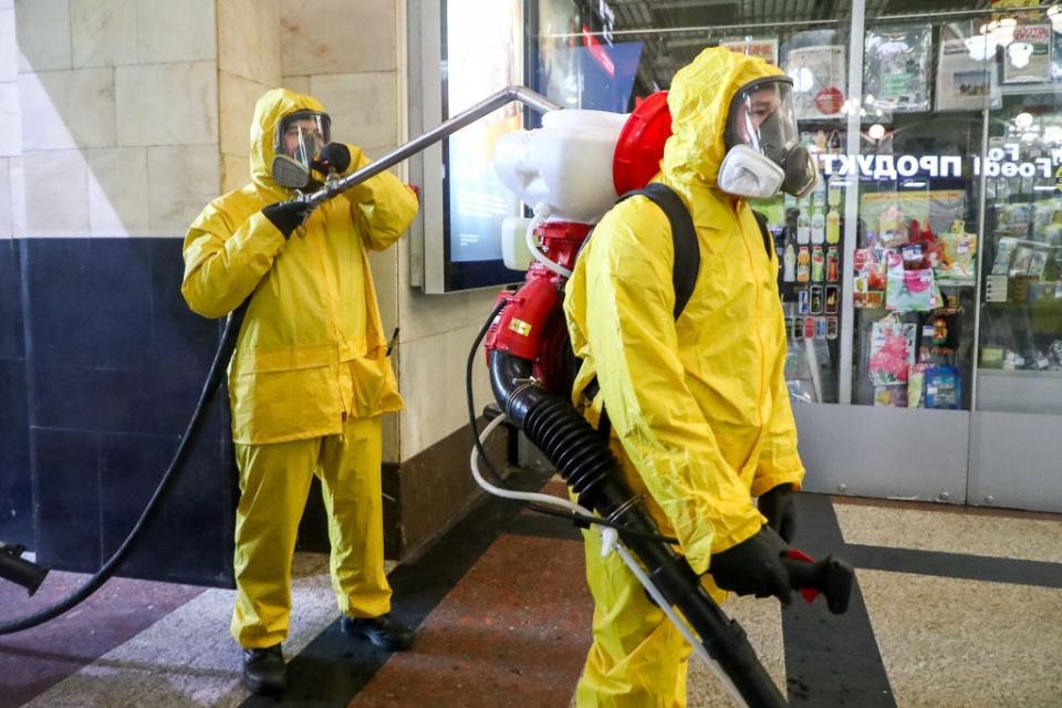 Russian Emergency Situations Ministry employees disinfect Kazansky Railway Station amid the ongoing coronavirus pandemic, on May 28, 2020.