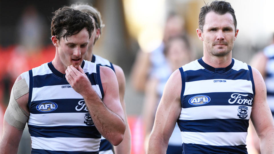 Patrick Dangerfield leads Geelong off the ground.