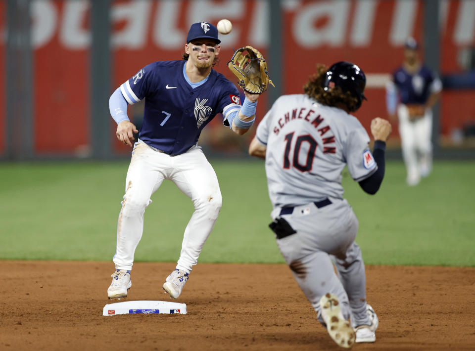 Kansas City Royals shortstop Bobby Witt Jr. catches the throw for the out on Cleveland Guardians' Daniel Schneemann (10) during the sixth inning of a baseball game in Kansas City, Mo., Friday, June 28, 2024. José Ramírez was out at first. (AP Photo/Colin E. Braley)