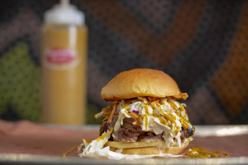 The Carolina is among the signature barbecue sandwiches served at Sugarfire Smoke House opening Monday, July 26 in Jacksonville.