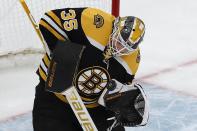 Boston Bruins' Linus Ullmark blocks a shot during the first period of the team's NHL hockey game against the Detroit Red Wings, Tuesday, Nov. 30, 2021, in Boston. (AP Photo/Michael Dwyer)