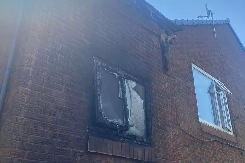 Extensive damage was caused to the outside of the building -Credit:Manchester Evening News