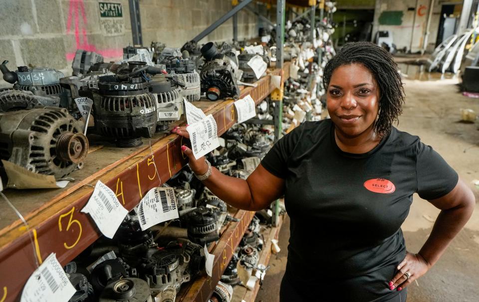Natasha Broxton stands next to a row of alternators Wednesday, Sept. 21, 2022, at Select Auto Parts and Sales located at 2500 W. Cornell St., Milwaukee. She is a woman and Black-owned salvage yard company where customers can come in and grab their parts without wait times. "The parts are inspected and tested and we provide free delivery services to other body shops in Milwaukee," she added. Her favorite part about her business is the give and take aspect. "The fulfillment of working with people in the community and being able to learn and grow along side my peers," she said. "I hire people who have the knowledge and expertise to be able to break down a vehicle. I am also able to learn from them and they can teach me things like how to test a starter or alternator."