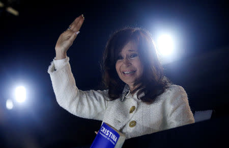 Argentina's former President Cristina Fernandez de Kirchner waves to supporters after the presentation of her book "Sinceramente", at the Buenos Aires book fair, in Buenos Aires, Argentina May 9, 2019. REUTERS/Agustin Marcarian