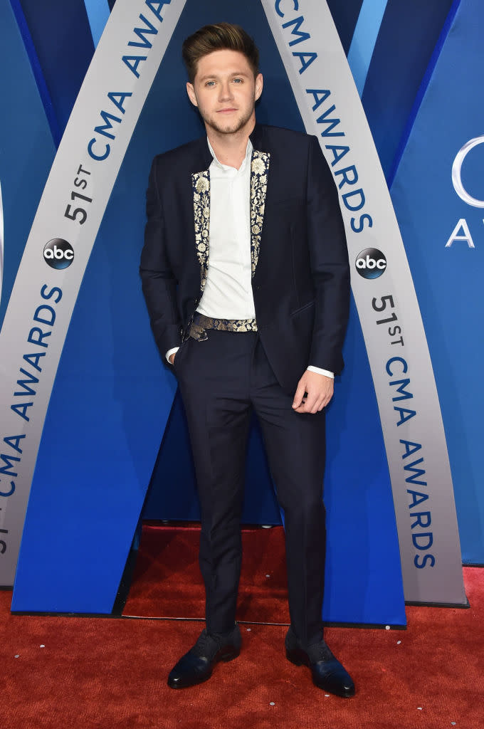 <p>The former member of One Direction wears a stylish suit before his debut CMA performance. (Photo: Getty Images) </p>