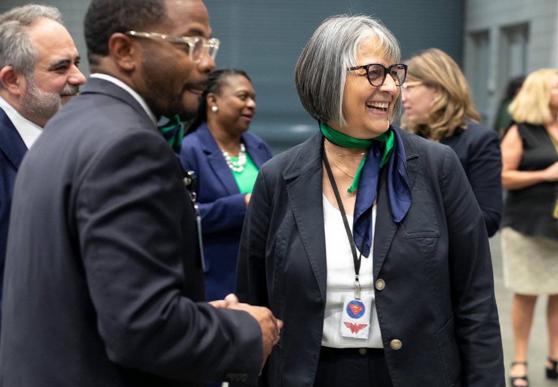 Wake County Public Schools Superintendent Catty Moore chats with the Leesville Road High School staff and students as she lines up to enter their commencement on Tuesday, June 13, 2023 at the Raleigh Convention Center in Raleigh, N.C.