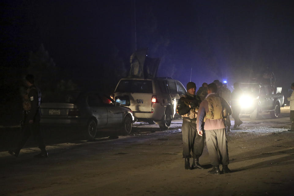 Afghan security personnel arrive at the site of explosion in Kabul, Afghanistan, Sunday, Nov. 24, 2019. An Afghan official said a blast in that capital Kabul targeting a United Nations vehicle has left at least 1 person dead. Nasrat Rahimi, spokesman for the Interior Ministry, said several others were wounded in the attack. (AP Photo/Rahmat Gul)