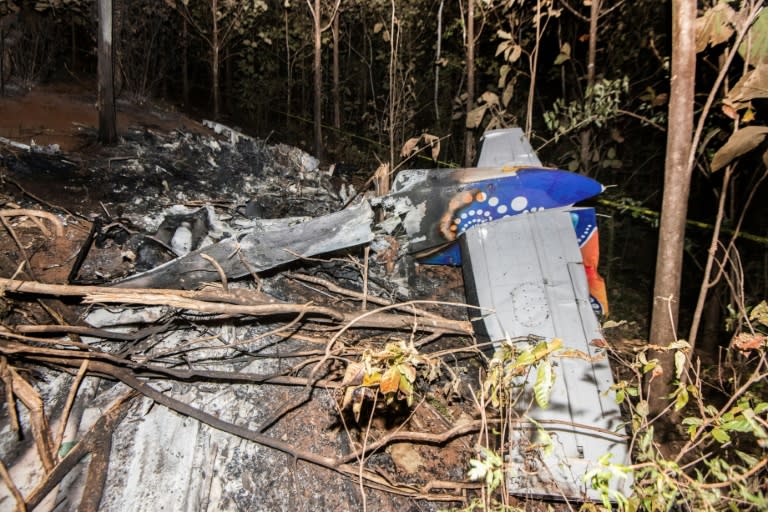 The tail of the burned fuselage of a small plane that crashed is seen in Guanacaste, Costa Rica