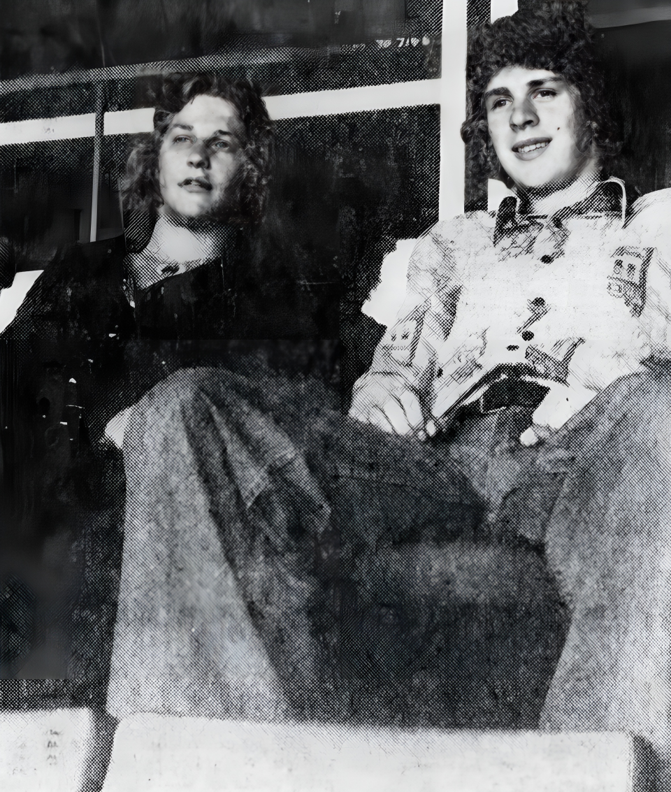 JUNE 11, 1976: Cincinnati Stingers' Gregg Carroll, left, and Barry Melrose, no hockey sticks available, look down on a Reds game at Riverfront Stadium.