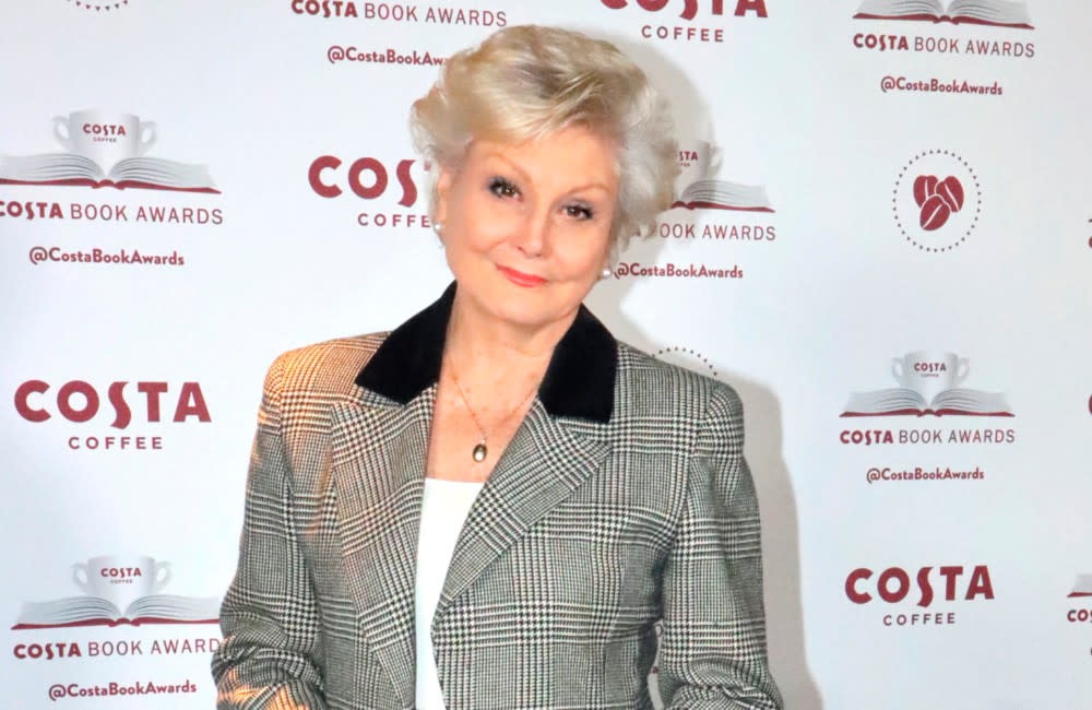 Angela Rippon thinks that being single keeps her working so much credit:Bang Showbiz