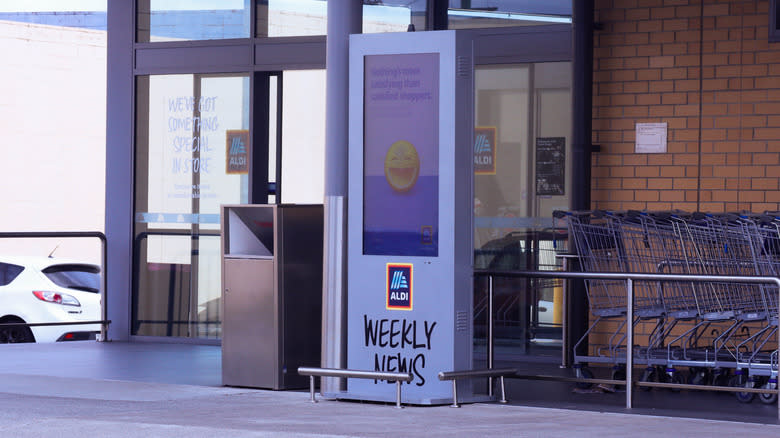 weekly news sign outside Aldi