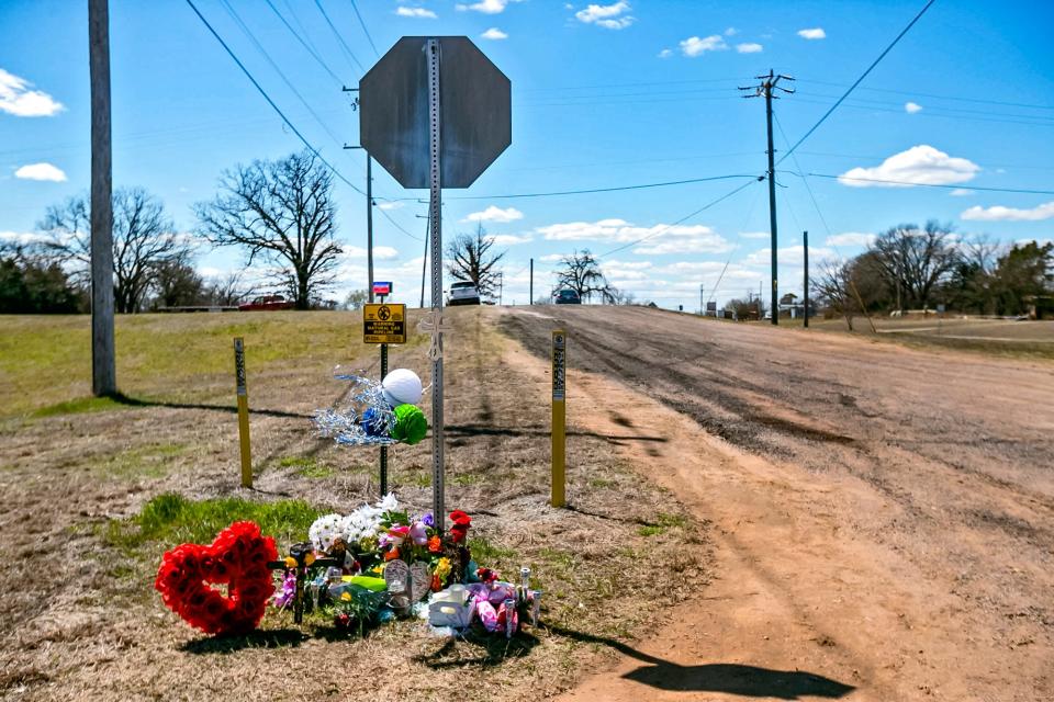 A memorial is set up after six high school students died Tuesday near Tishomingo, about 130 miles south of Oklahoma City.