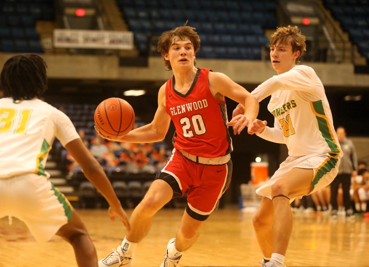 Chatham Glenwood's Mason Marshall drives against Normal U-High during the Capital City Showcase at the Bank of Springfield Center on Saturday, Dec. 2, 2023.