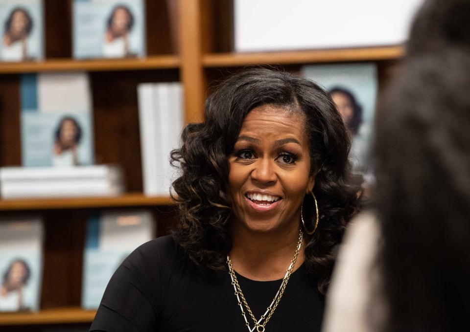 Michelle Obama got candid about her own journey of fertility issues and miscarriage in her 2018 memoir. (Photo by Nicholas Kamm/AFP via Getty Images)