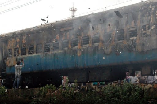 At least 32 people were killed Monday when a fire ripped through a coach on an express train as it carried sleeping passengers to the southern Indian city of Chennai