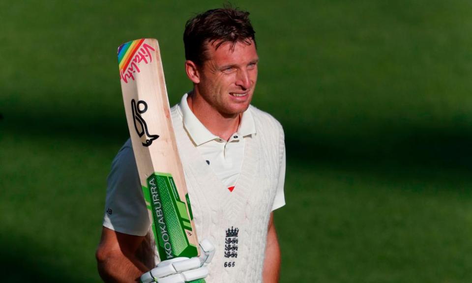 England’s Jos Buttler returns to the pavilion after his 152.