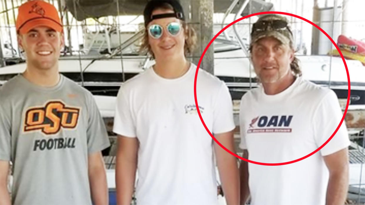 Mike Gunday, pictured here wearing an OAN shirt during a fishing trip.