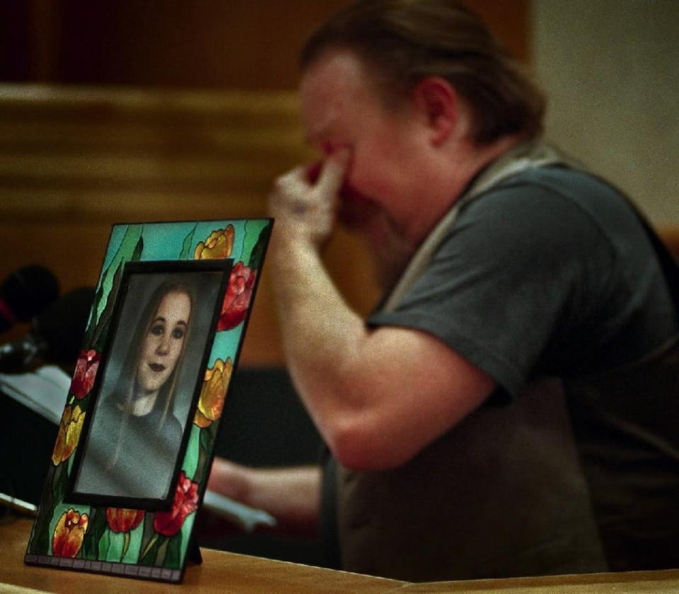 Phil Ellenbecker weeps while addressing the court during a sentencing hearing of Jeremy Holmes, the driver in a fatal van crash in March that killed seven people. Ellenbecker's daughter, Malinda Turvey, was one of the crash victims.