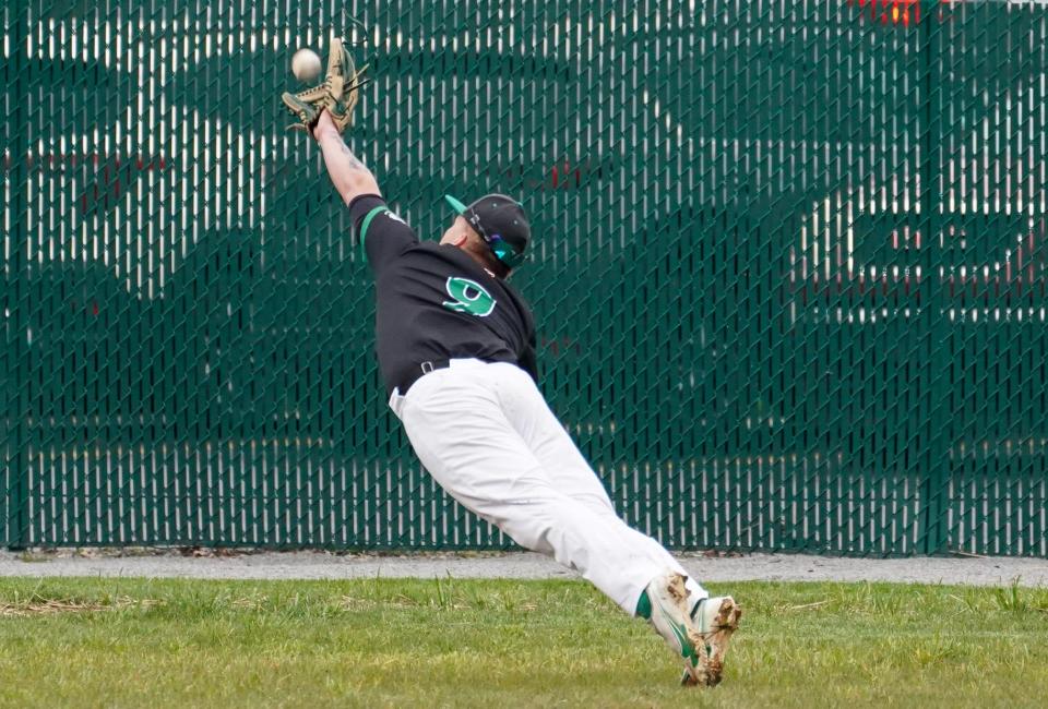 Clear Fork's Champ DeLancy makes a spectacular diving catch in right field during the Colts' 3-0 win over Ontario on Monday night.