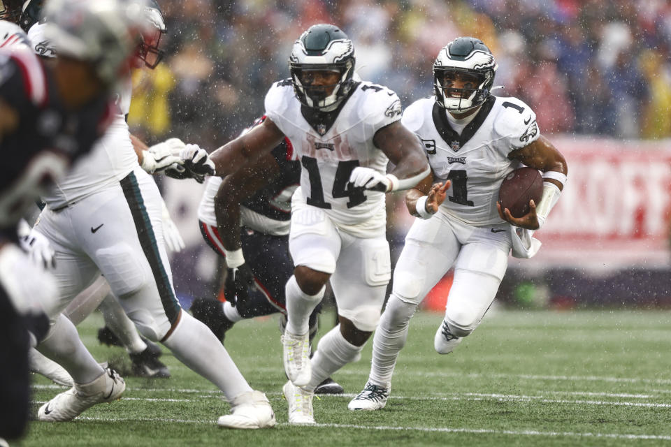 FOXBOROUGH, MA - SEPTEMBER 10: Jalen Hurts #1 of the Philadelphia Eagles carries the ball during the first quarter of an NFL football game against the New England Patriots at Gillette Stadium on September 10, 2023 in Foxborough, Massachusetts. (Photo by Kevin Sabitus/Getty Images)