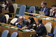 Members of Venezuela's delegation attend the United Nations General Assembly at U.N. headquarters Thursday, Sept. 26, 2019. (AP Photo/Kevin Hagen)