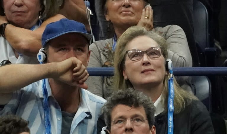 Actress Meryl Streep absorbed in the tense second-set battle between Novak Djokovic and Juan Martin del Potro in the US Open final