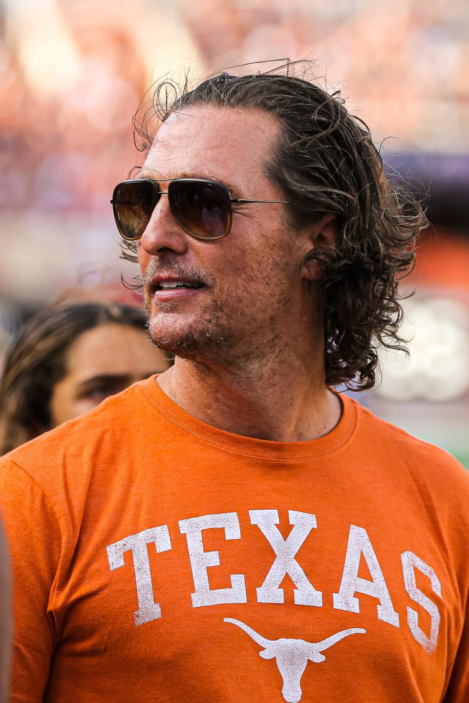 Matthew McConaughey stands on the sideline before Texas's annual spring football game at Royal Memorial Stadium in Austin, Texas on April 23, 2022.