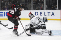 Los Angeles Kings goaltender Cal Petersen (40) blocks a shot by Ottawa Senators right wing Connor Brown (28) in the first period of an NHL hockey game Saturday, Nov. 27, 2021, in Los Angeles. (AP Photo/Kyusung Gong)