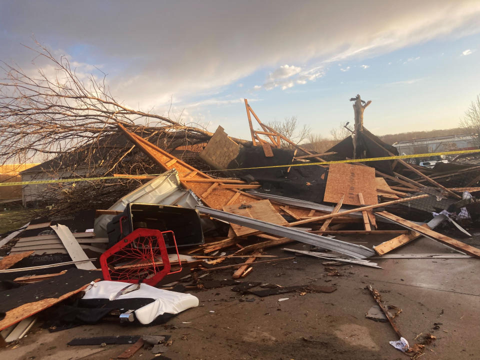 Homes are damaged after a tornado swept through Coralville, Iowa, Friday, March 31, 2023. (AP Photo/Ryan Foley)