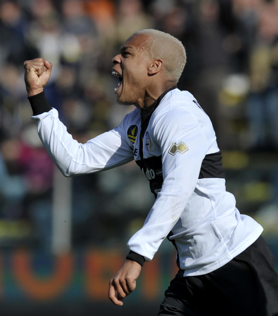 Parma's Jonathan Biabiany of France celebrates after scoring during a Serie A soccer match against Verona, at Parma's Tardini stadium, Italy, Sunday, March 9, 2014. (AP Photo/Marco Vasini)