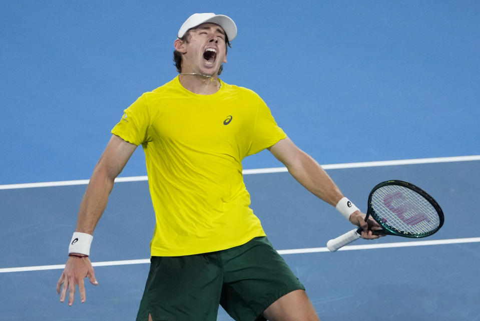 Australia's Alex de Minaur celebrates after defeating Germany's Alexander Zverev during their United Cup semifinal tennis match in Sydney, Australia, Saturday, Jan. 6, 2024. (AP Photo/Mark Baker)