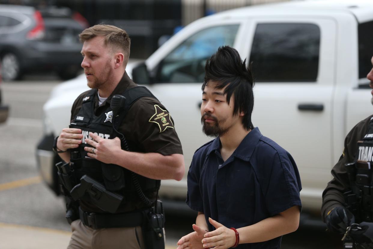 Deputies escort murder suspect Ji Min Sha, 23, into the Tippecanoe County Courthouse on March 24, 2023, for a hearing to determine if he is competent to stand trial. Sha is charged with killing his roommate, Varun Manish Chheda, 20, of Indianapolis, early Oct. 5, 2022, inside their Purdue University dorm room.