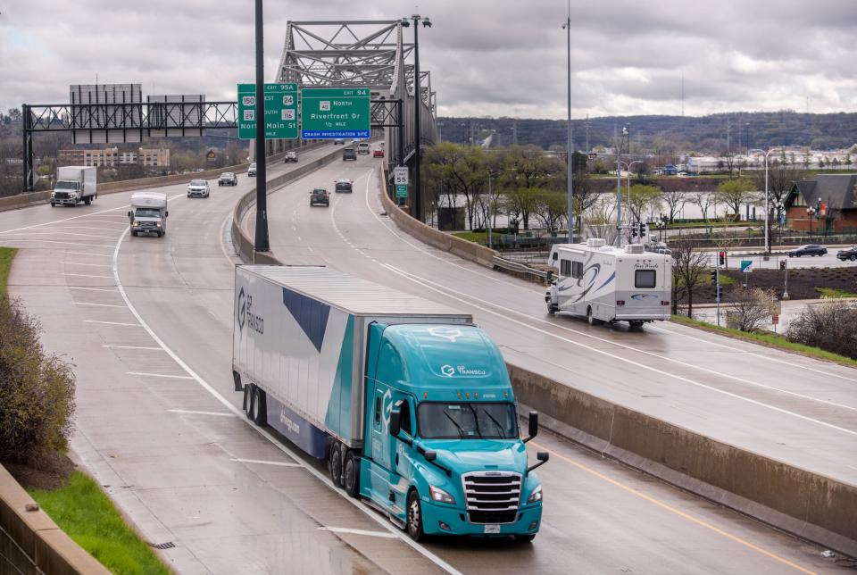 A semi-tractor trailer crosses the Murray Baker Bridge into Peoria.